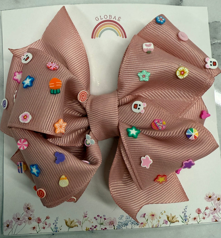 Moño mediano figuritas