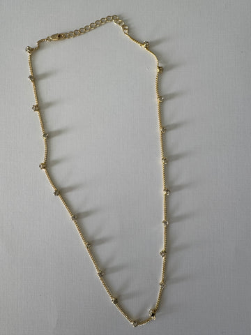 Collar piedras dorado